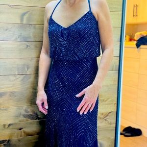 Long formal beaded dress.